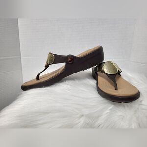 Crocs Women's Brown Sandals with Gold Accents, Size 6